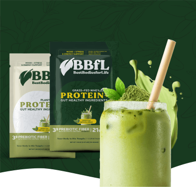 Two packages of BBFL Lifestyle Shake (Matcha Cream) are displayed next to a glass of green matcha drink with a straw.